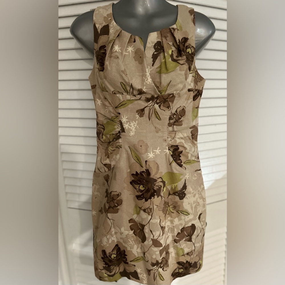 Adrianna Papell surplice neckline mini dress in a tan and green floral print